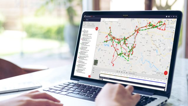 Employee using LiveRoute fixed route tracking for waste operations